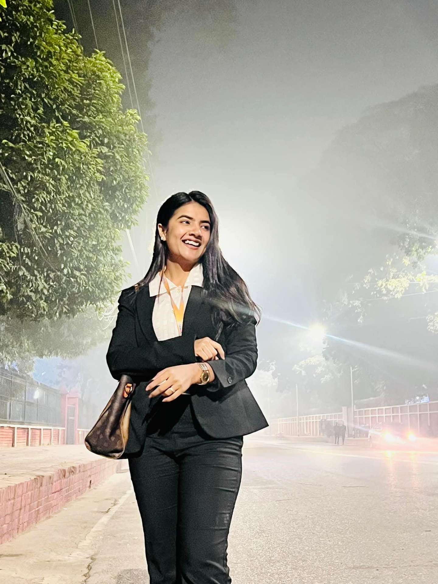 Prety Chowdhury — black blazer foggy night street signature look