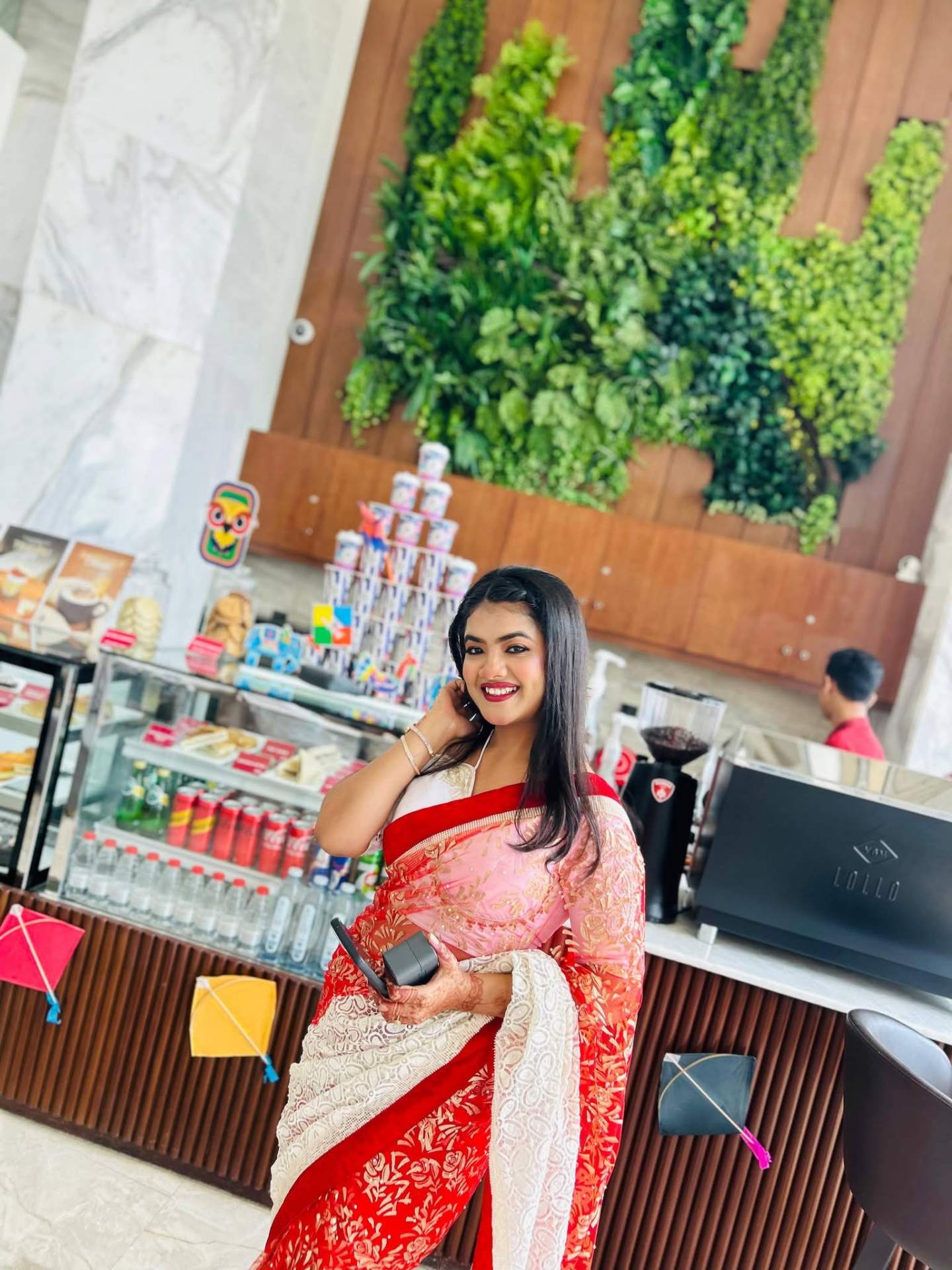 Prety Chowdhury — Ramada Cox's Bazar Lollo Café red & white saree portrait