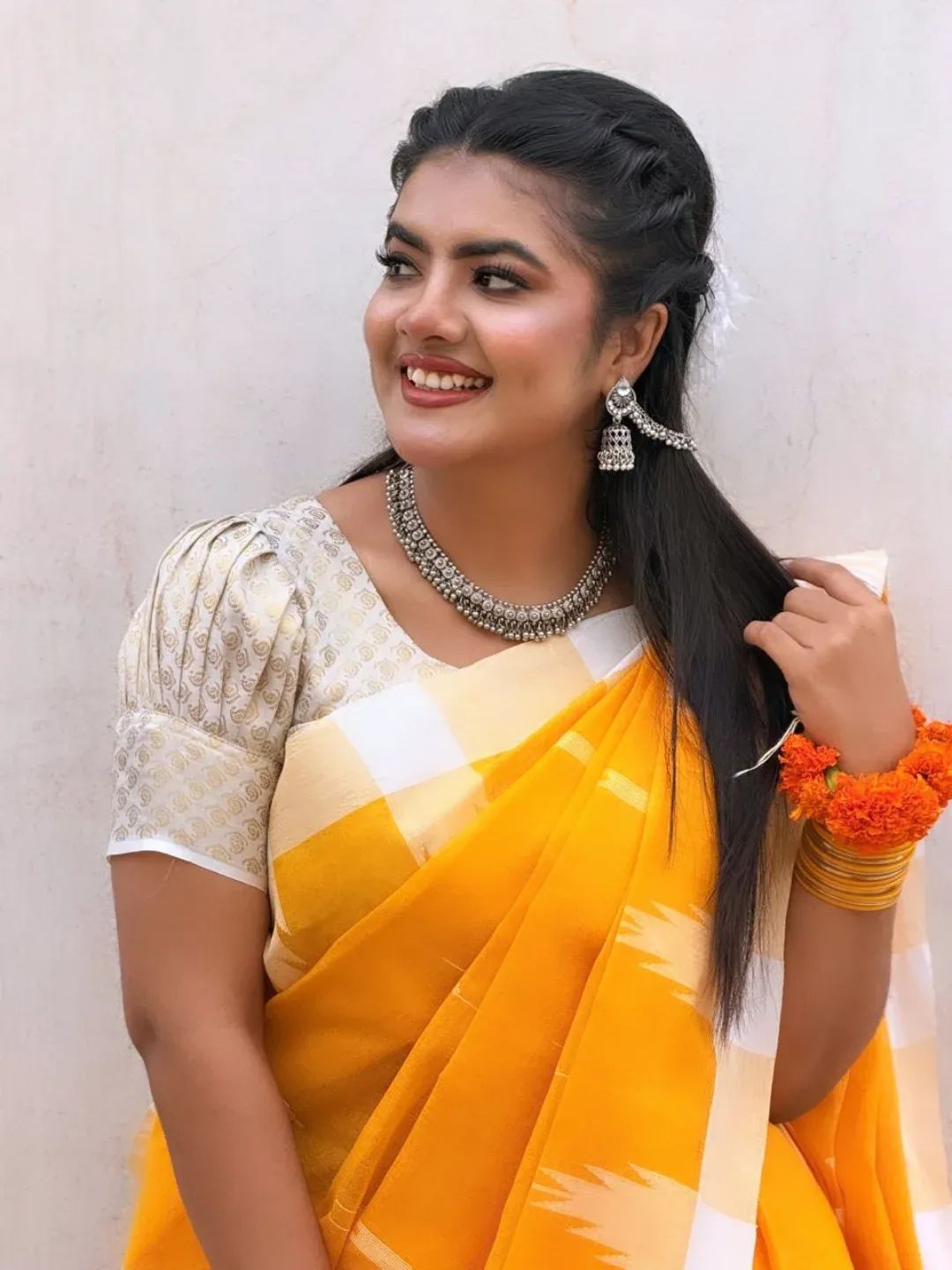 Prety Chowdhury — golden saree portrait