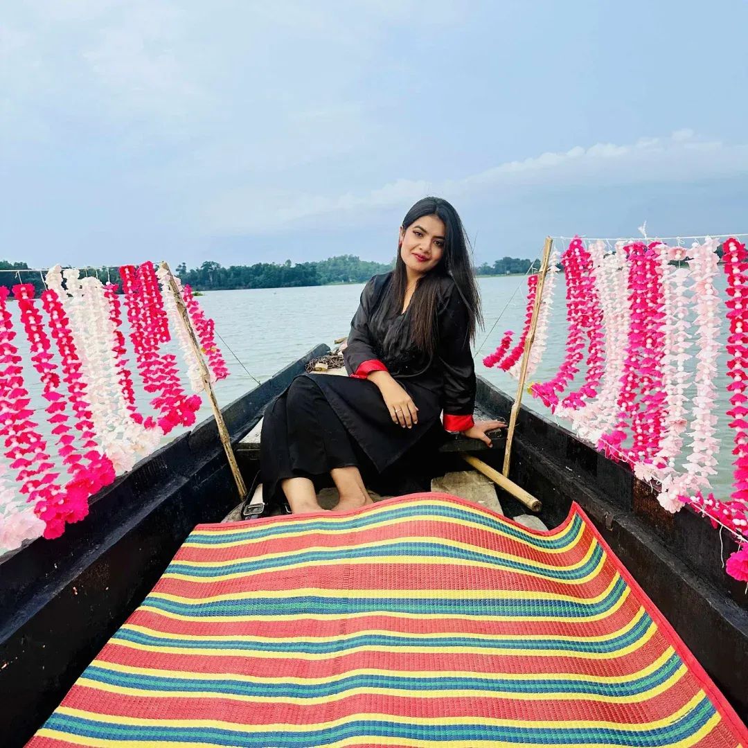 Prety Chowdhury — riverside boat portrait