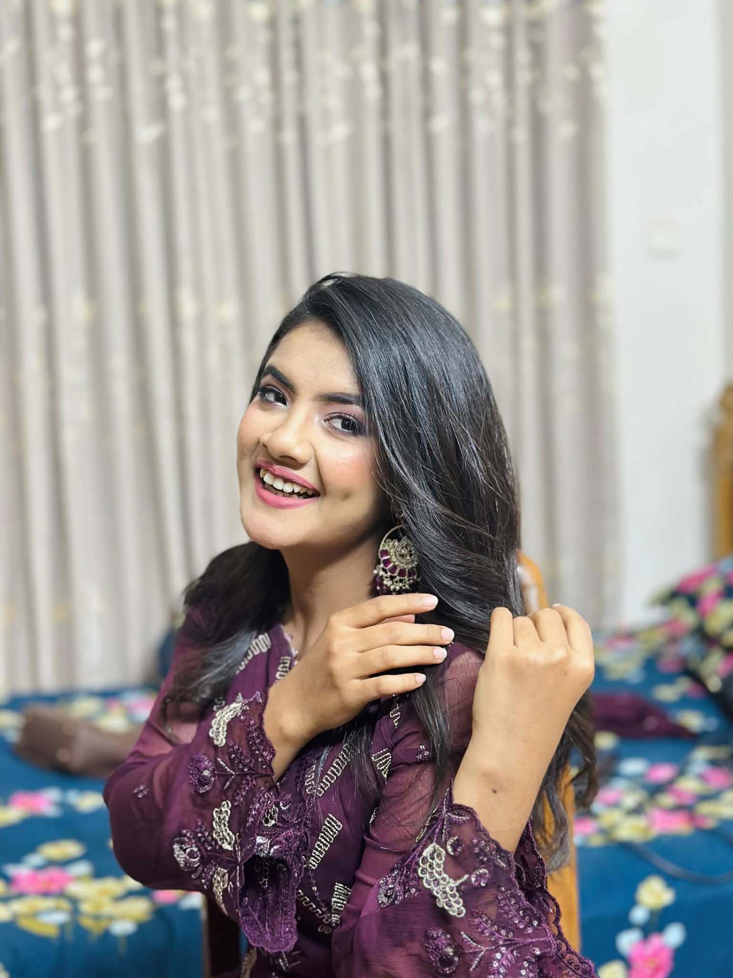 Prety Chowdhury — plum sequin glow