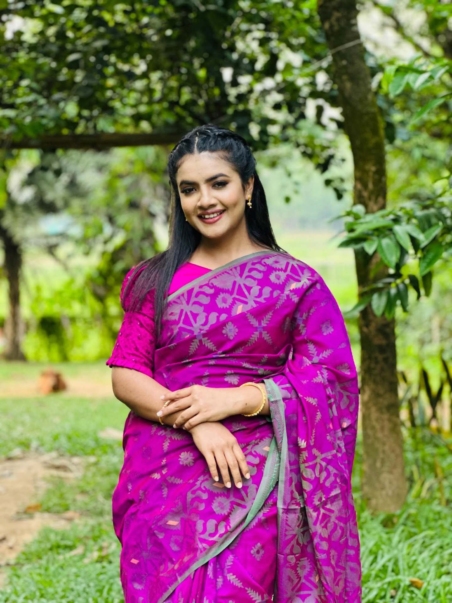 Prety Chowdhury — magenta jamdani saree in nature