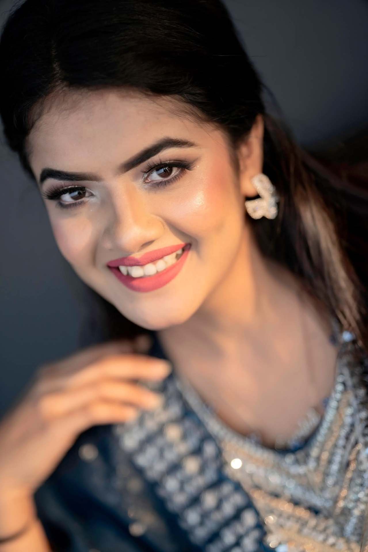 Prety Chowdhury — close-up sapphire glam portrait